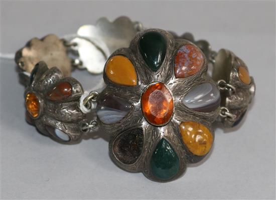 A Scottish silver and multi hardstone set bracelet (lacking one stone).